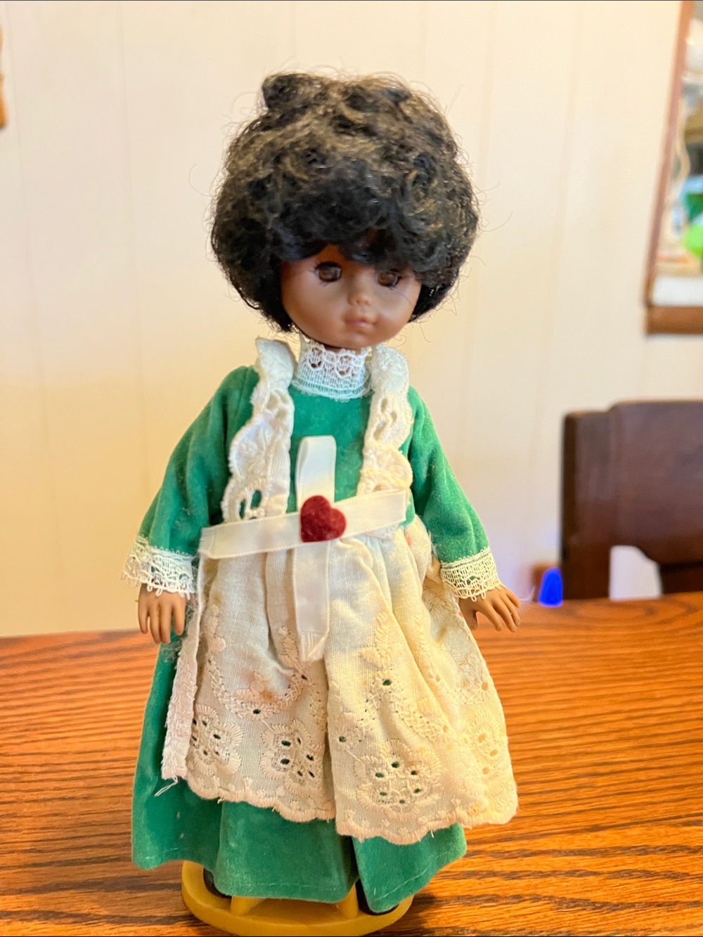 Classic Green-Trimmed Doll with White Apron and Heart Accent